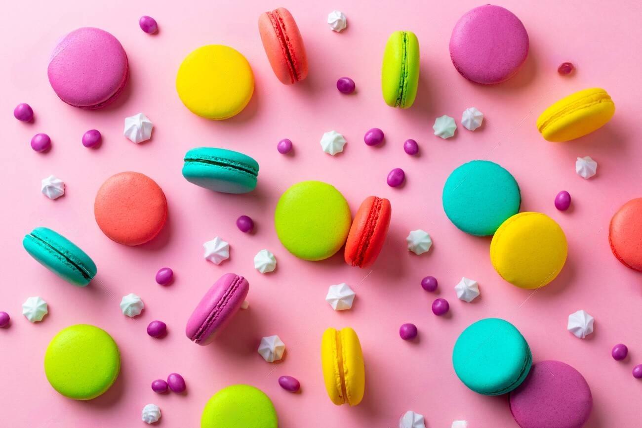 140539222-macaroons-dessert-on-pink-pastel-background-flat-lay-composition-top-view-transformed